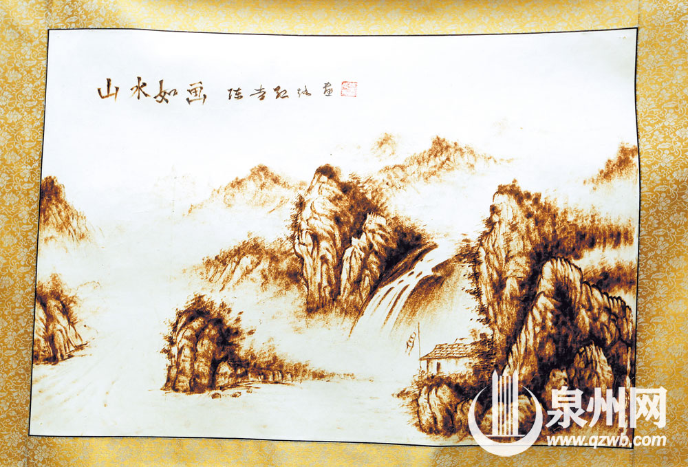 用烙铁做出的山水画