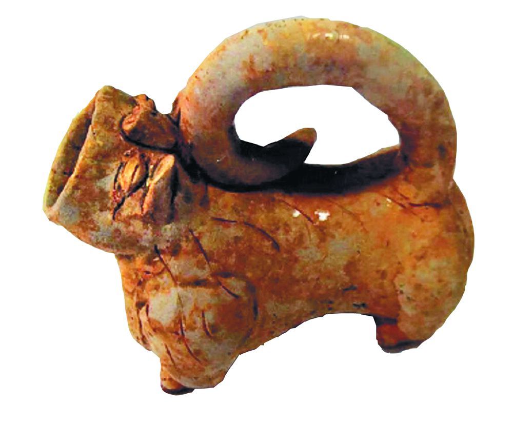 晋江内坑唐墓出土的虎子 