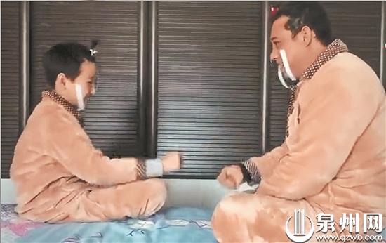 泉州昇文小学学生和家长在家做亲子游戏